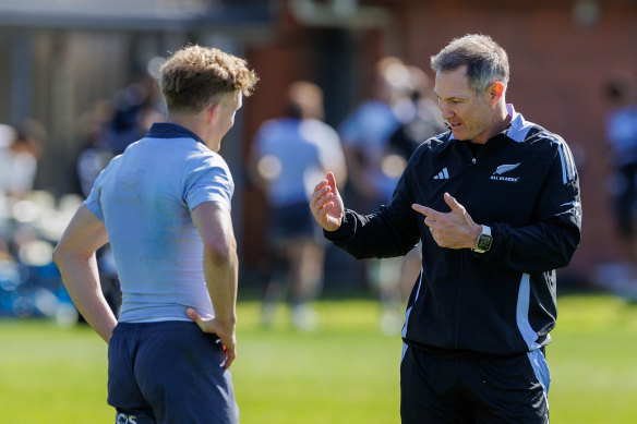 Damian McKenzie and Leon MacDonald during an All Blacks training session.