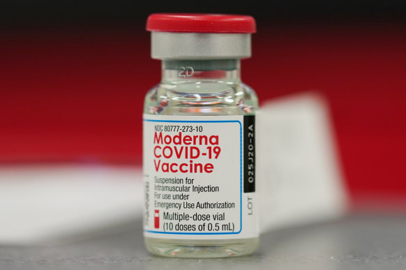 A vial of Moderna COVID-19 vaccine in the first round of staff vaccinations at a hospital in Denver. 