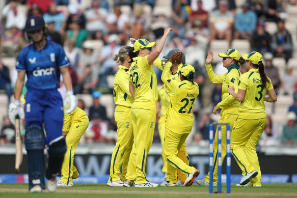 Australia celebrate the wicket of England batter Amy Jones.