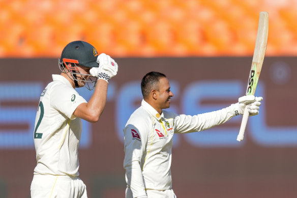 Usman Khawaja salutes his first Test century against India.