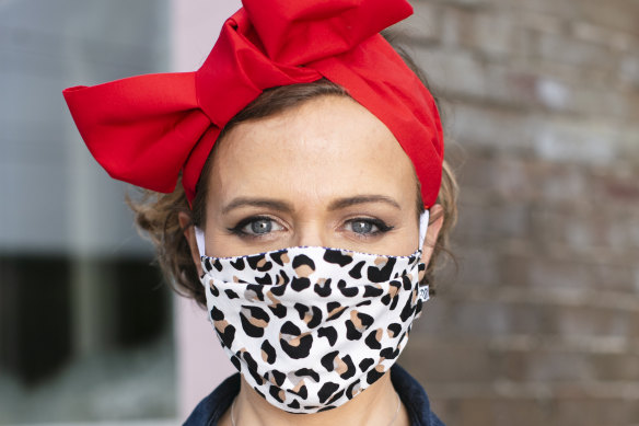 Milliner Chantelle Ford in one of her face masks she has started making in response to the pandemic.