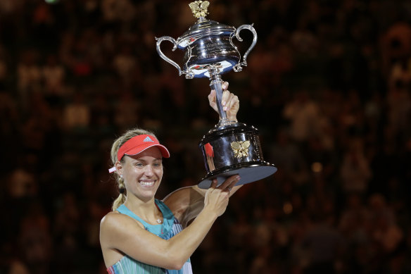 Angelique Kerber holding the trophy after winning the 2016 Australian Open.