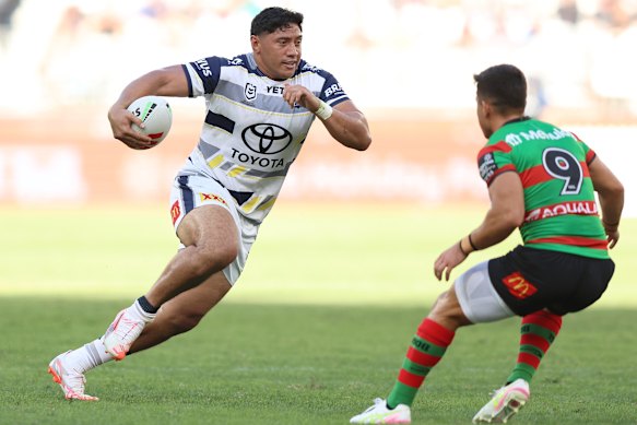 Jason Taumalolo of the Cowboys runs the ball.