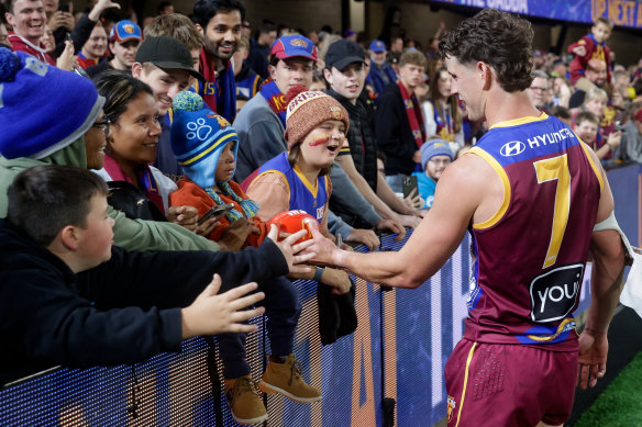 Jarrod Berry of the Lions interacts with fans.