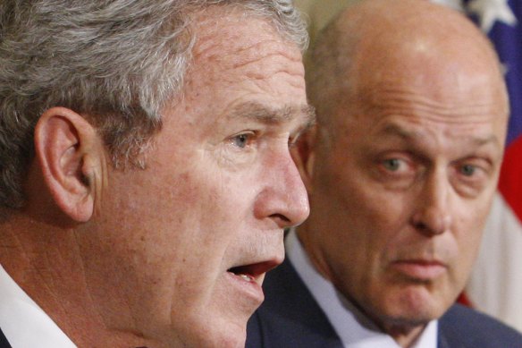 Then-treasury secretary Henry Paulson (right) with then-president George W. Bush at a White House briefing in 2007.