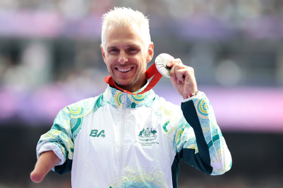 Michael Roger celebrates his silver medal. 