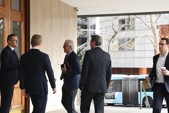 Men arrive at the men’s only Australian Club which is holding a vote to determine if women can become permanent members.