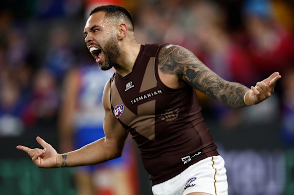 Jarman Impey celebrates a telling Hawks goal.