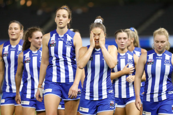 Emma Kearney looks dismayed as she leads the Kangaroos off after they failed to kick a goal in their loss to Collingwood.