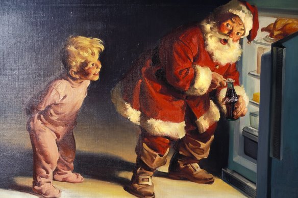 A Coca-Cola advertisement featuring Santa. 