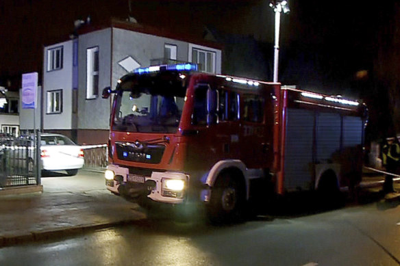A fire engine outside an escape room in Koszalin, northern Poland that was engulfed by fire.