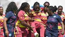 Deandra Dottin is carried from the field.
