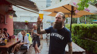 Young Henry’s owner, Oscar McMahon, celebrates the festive season at a street party in Newtown on December 7.