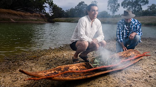 Art Gallery of NSW Indigenous educator Wesley Shaw with Barkandji artist Badger Bates at the launch of Barkandji canoe 