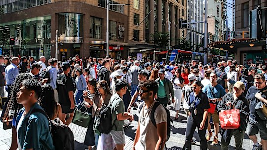 Boxing Day shoppers convene on Pitt Street Mall in Sydney on Thursday.