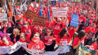 School teachers march along Macquarie St towards NSW Parliament on May 04, 2022  in defiance of an Industrial Relations Commission order.