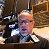 Wall Street remains in the green after the Fed held fire on interest rates. 