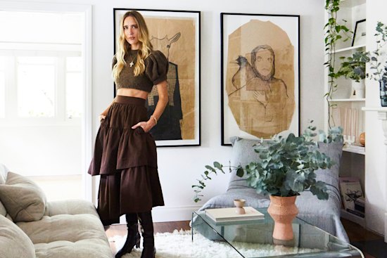 “I love curating a communal space that my friends and family can share,” says Bailey, standing in the lounge room. “The artworks are by my talented cousin, Jay Paul Harrison.”