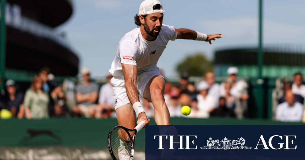 Australia’s back-brace-wearing marathon man survives again at Wimbledon