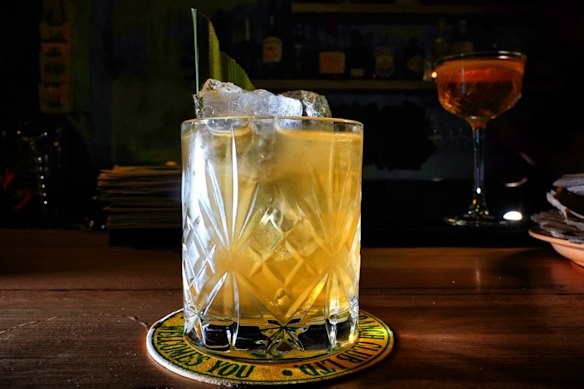 Pandas of the Caribbean cocktail featuring pandan, dark rum, velvet falernum, lime and banana.