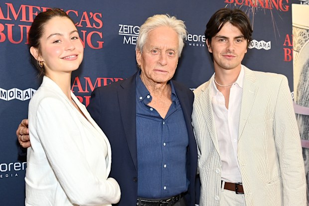 NEW YORK, NEW YORK - JULY 10: (L-R) Carys Zeta Douglas, Michael Douglas and Dylan Douglas attend the NY Special Screening of "America's Burning" at DGA Theater on July 10, 2024 in New York City. (Photo by Roy Rochlin/Getty Images for Abramorama)