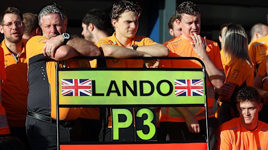 The McLaren chief executive officer Zak Brown with Oscar Piastri in pit lane after the team decided to prioritise Lando Norris in the Australian Grand Prix.