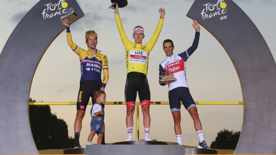 Tour de France winner Tadej Pogacar on the top step with Primoz Roglic (left) and Richie Porte (right).