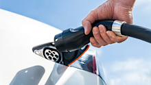 As electric vehicle adoption surges, a divide is emerging over who gets to build and run the chargers needed to keep NSW on the road.
