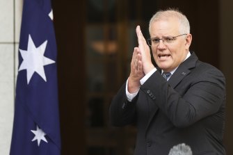 Prime Minister Scott Morrison explaining the trajectory of the Omicron outbreak on Wednesday.
