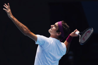 Motivated: Swiss champion Roger Federer practises at Melbourne Park ahead of the Australian Open.