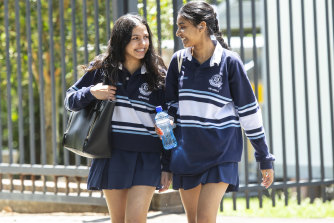HSC students Mirutikka Surendiran and Sneha Parajuli depart Burwood Girls High School after their HSC maths exam on Monday afternoon.