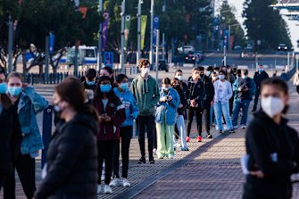 Hundreds of Year 12 students queue for their first dose of the Pfizer vaccine at Qudos Bank Arena.
