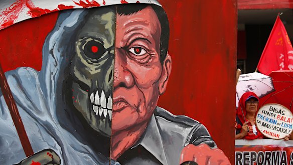 A protester during a rally by farmers last month to protest against the alleged killings of more than 150 farmers under Duterte's term.