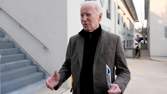 President Joe Biden speaks with reporters as he leaves St. Edmund Roman Catholic Church in Rehoboth Beach, Delaware.