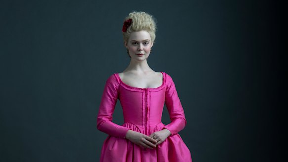 Fanning, pretty in pink, as Catherine the Great, Empress of Russia.