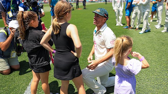 David Warner with his three daughters.