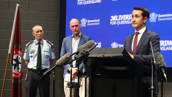 Queensland Premier David Crisafulli (right) gives an update on the cyclone on Saturday.