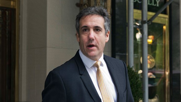 Michael Cohen, former personal lawyer to President Donald Trump, leaves his apartment building in New York on Tuesday.
