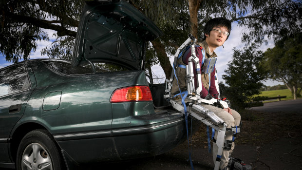 Alan, sitting on his green Toyota Camry.