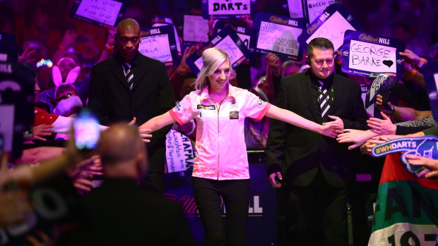 Fallon Sherrock enters the stage during her third-round match against Chris Dobey. 