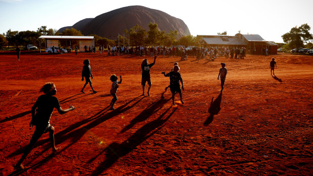 Children playing football at the First Nations National Convention at Uluru in May 2017.