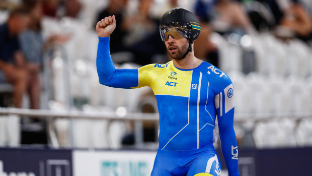 Nathan Hart celebrates his first men's sprint win at the national cycling championships in Brisbane on Thursday.