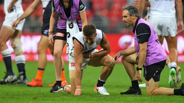 Marc Murphy after being crunched by the Giants' Shane Mumford.