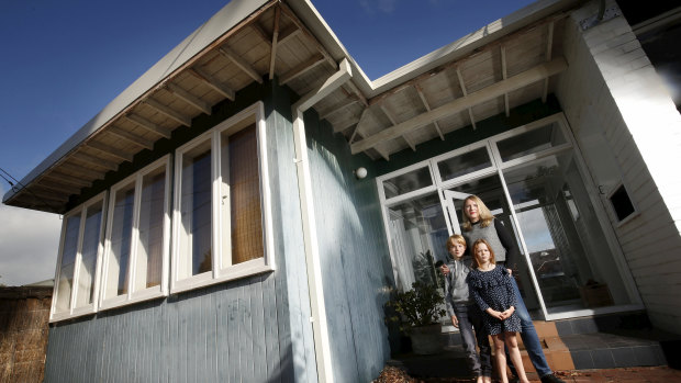 Laura Beilby and her children at their mid-century house in Beaumaris, which was built by architect Eric Lyon in the 1950s.