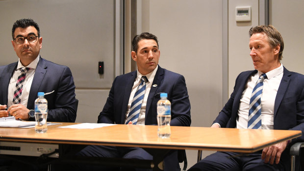 Waiting game: Billy Slater (centre) and Craig Bellamy (right) with lawyer Nick Ghabar.