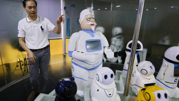 Simon Wang introduces Canbot’s robot family to visitors at Canbot headquarters in Shenzhen.