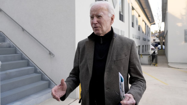 President Joe Biden speaks with reporters as he leaves St. Edmund Roman Catholic Church in Rehoboth Beach, Delaware.