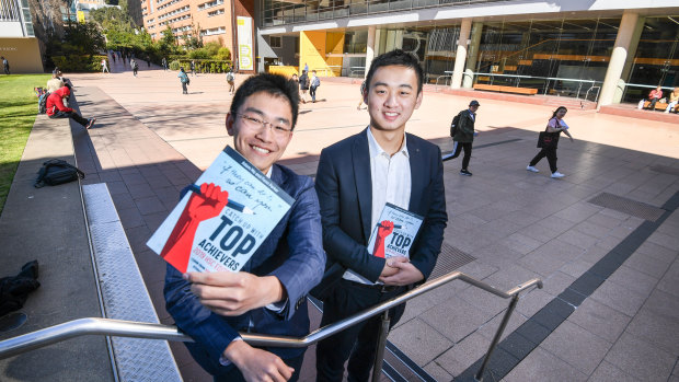Adam Ma, left, invited last year's top HSC achievers to share their study tips in his new book. Tim Yang, who was first in the state in business studies, was among them. 