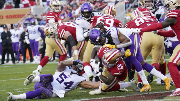 San Francisco 49ers running back Tevin Coleman dives to score a touchdown against the Minnesota Vikings in Santa Clara, California.