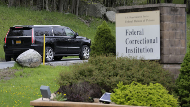 A car carrying Cohen arrives at federal prison in Otisville, New York.